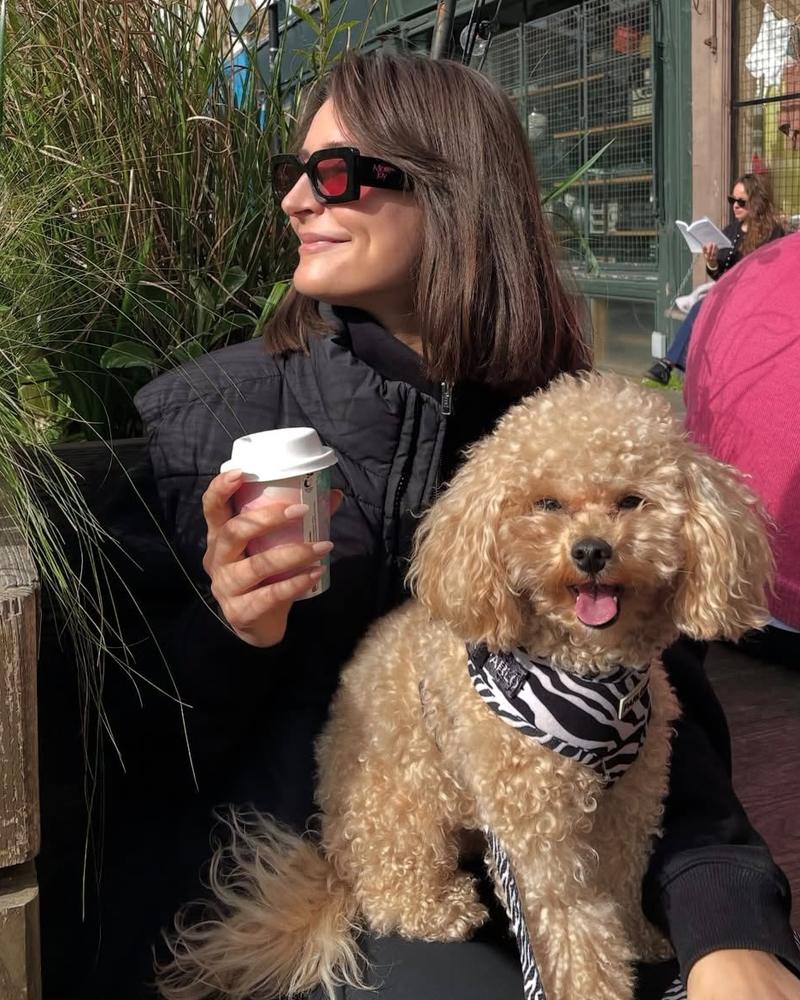 Roxy with Frankie, her apricot toy poodle, at a cafe